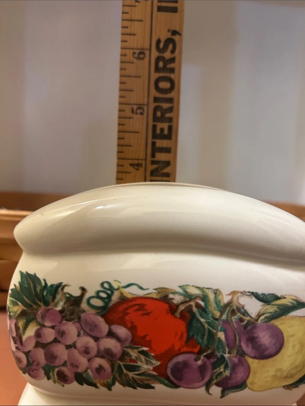 VTG Cornucopia ceramic napkin holder featuring a colorful raised fruit mot